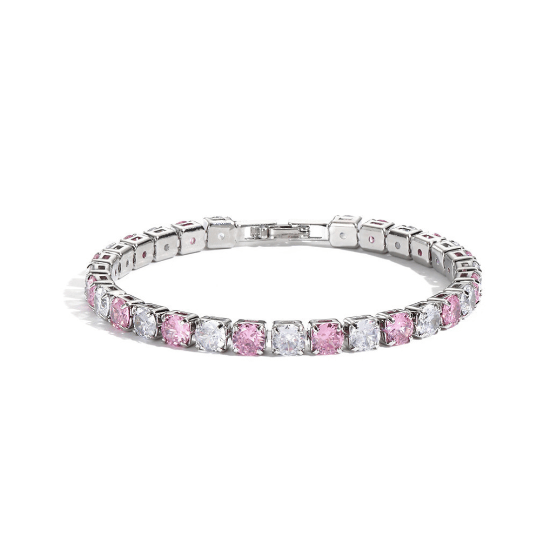 Silver bracelet with pink and clear gemstones on a white background