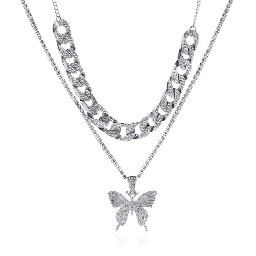 Two silver necklaces with butterfly pendants on a white background