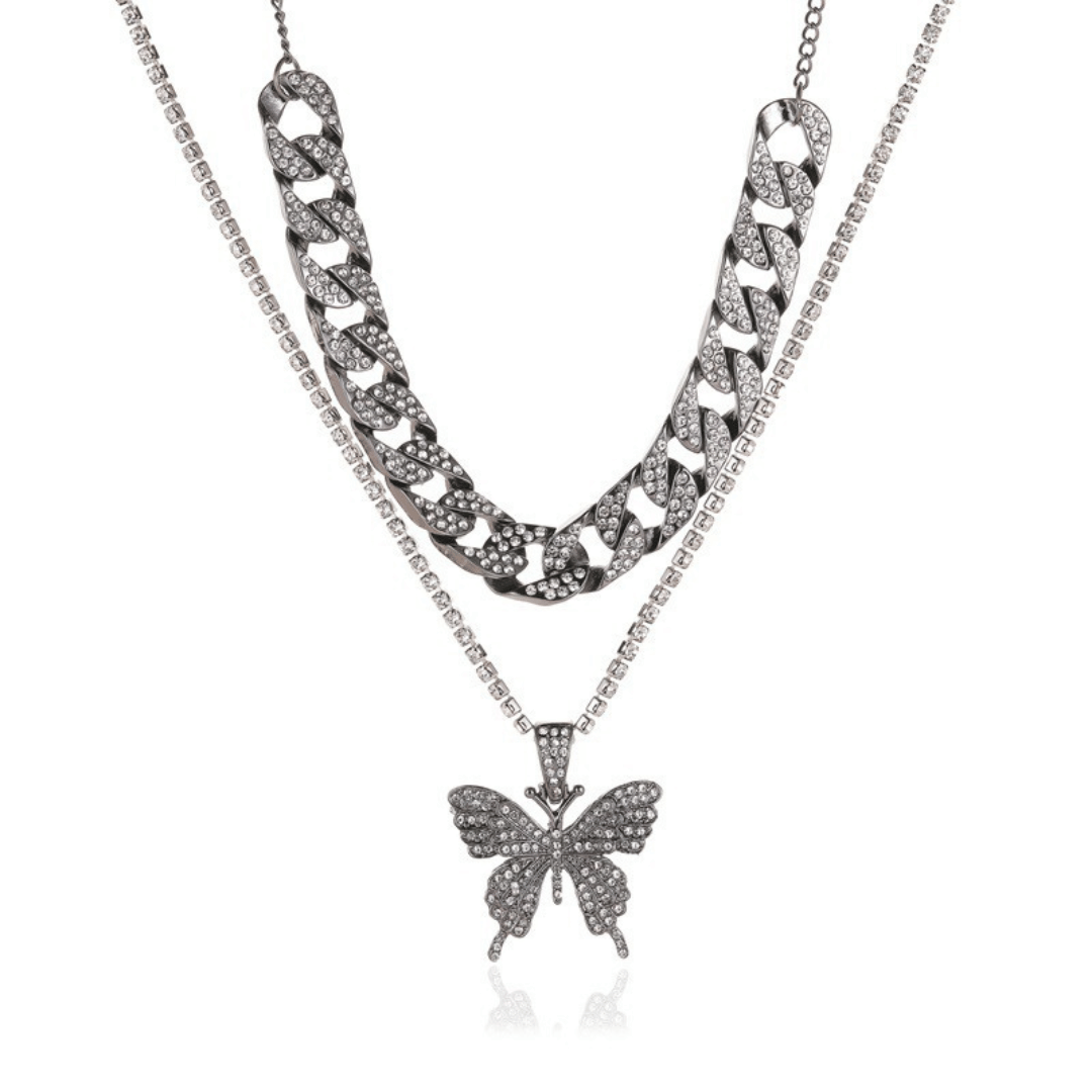 Butterfly pendant necklace on a white background