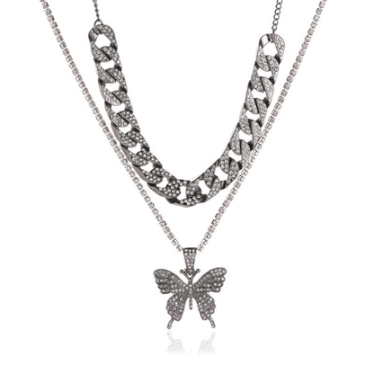 Butterfly pendant necklace on a white background