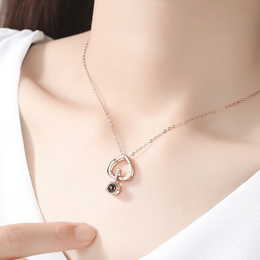 Necklace with a heart-shaped pendant on a mannequin neck