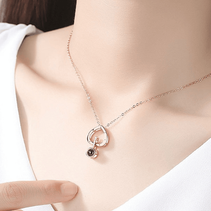Necklace with a heart-shaped pendant on a mannequin neck