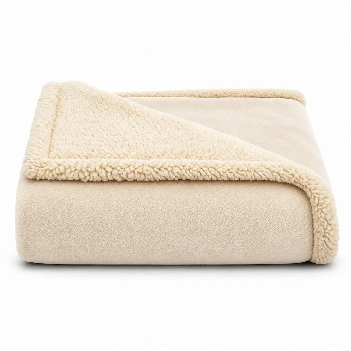 A folded cream-colored fleece blanket with a sherpa lining, shown on a clean white background.