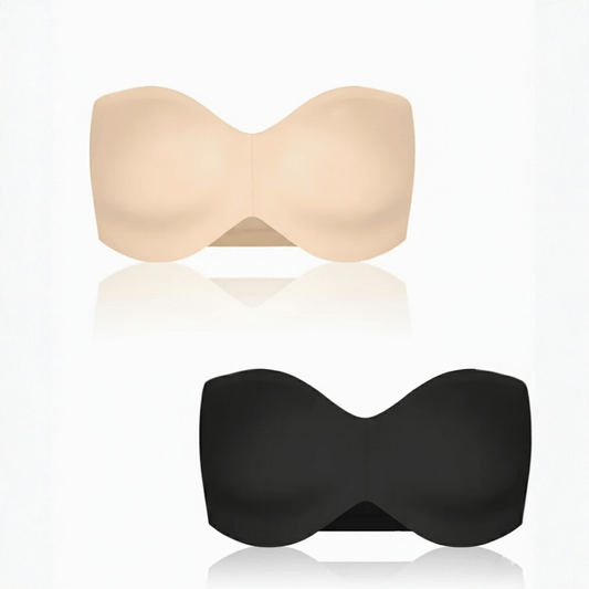 Beige and black strapless bras on a white background